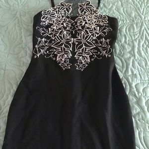Black bodycon dress with white lace